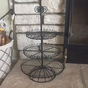 3 tier metal circular stand.